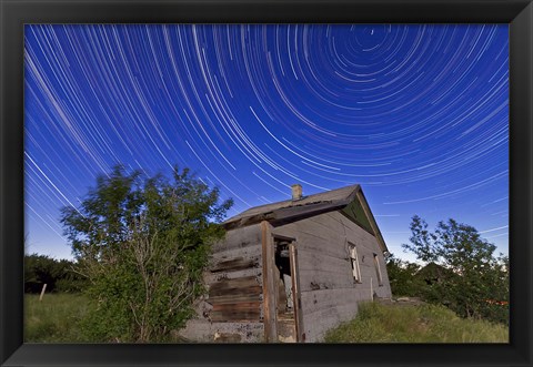 Framed Circumpolar star trails above an old farmhouse in Alberta, Canada Print