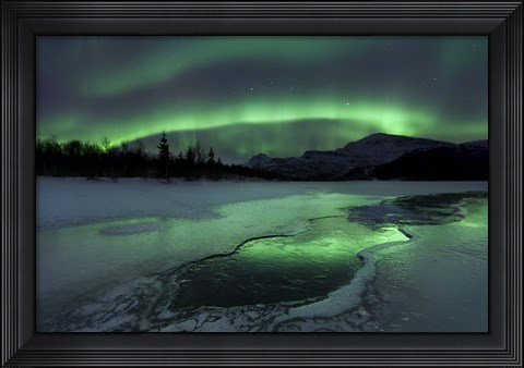 Framed Reflected aurora over a frozen Laksa Lake, Nordland, Norway Print
