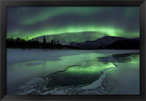 Framed Reflected aurora over a frozen Laksa Lake, Nordland, Norway Print