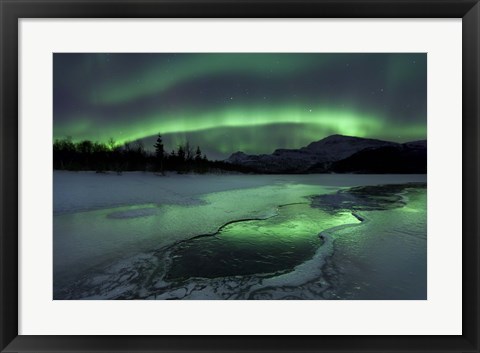 Framed Reflected aurora over a frozen Laksa Lake, Nordland, Norway Print