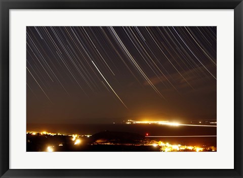 Framed Star trails above a village in the central desert of Iran Print