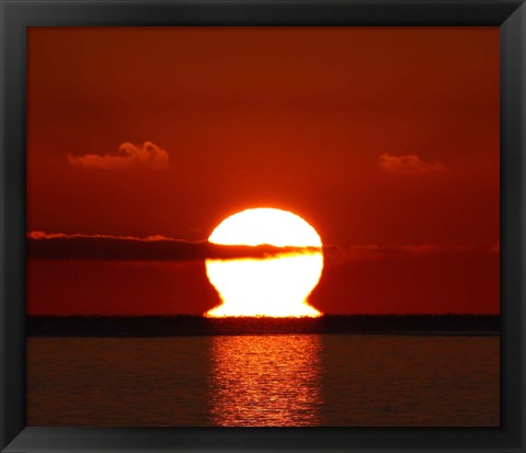 Framed omega-shaped sunrise above the water in Buenos Aires, Argentina Print
