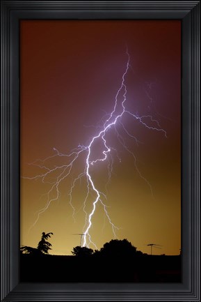 Framed bright bolt of lightning at the suburbs of Buenos Aires, Argentina Print