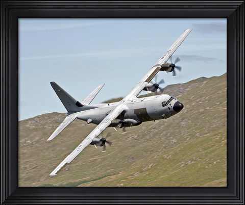 Framed C-130J Super Hercules low flying over North Wales on a training flight Print