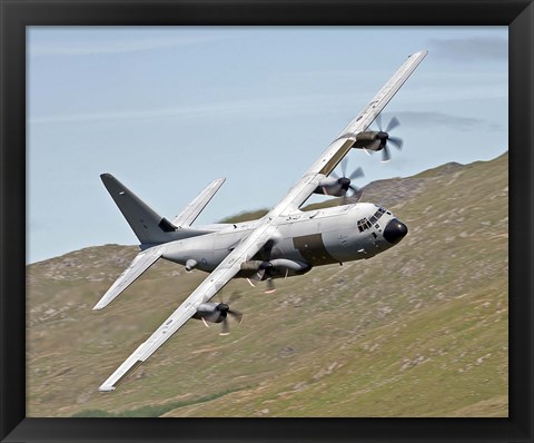 Framed C-130J Super Hercules low flying over North Wales on a training flight Print