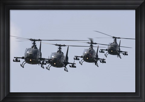 Framed Serbian Air Force Soko SA-342L GAMA choppers in flight over Serbia Print