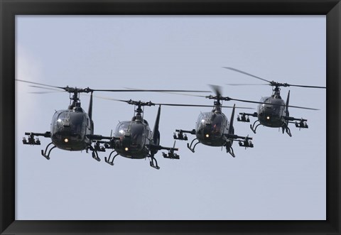 Framed Serbian Air Force Soko SA-342L GAMA choppers in flight over Serbia Print