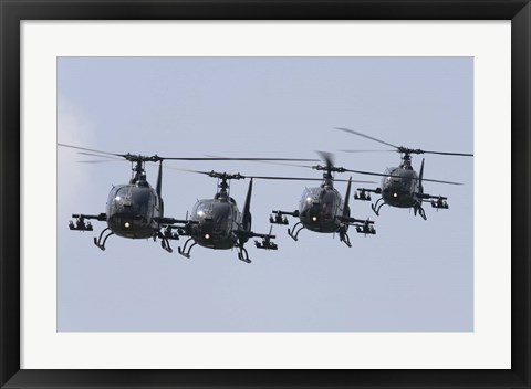 Framed Serbian Air Force Soko SA-342L GAMA choppers in flight over Serbia Print