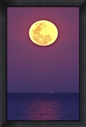 Framed Thunder&#39;s Moon and its reflection above the water Print