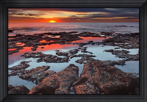 Framed Tidal pools reflect the sunrise colors during the autumn equinox Print