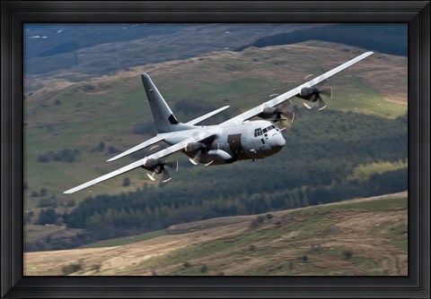 Framed C-130 Hercules of the Royal Air Force flying over North Wales Print