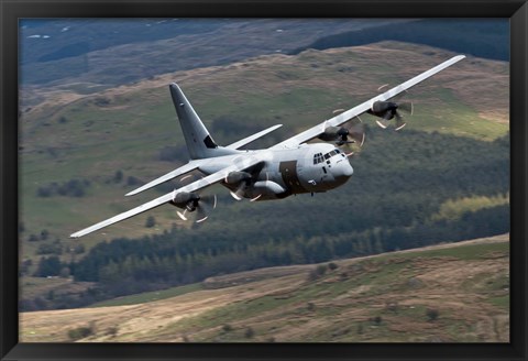 Framed C-130 Hercules of the Royal Air Force flying over North Wales Print