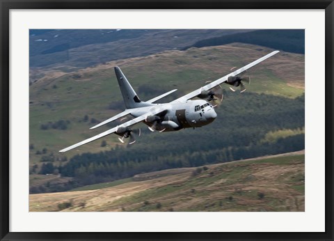 Framed C-130 Hercules of the Royal Air Force flying over North Wales Print