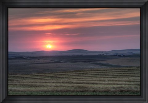 Framed Setting sun over harvested field, Gleichen, Alberta, Canada Print