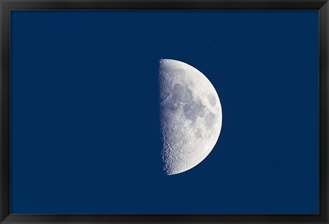 Framed First quarter moon taken near sunset with sky still bright in twilight Print