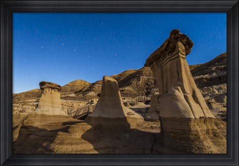Framed Stars over the hoodoos in the Red Deer River valley, Alberta, Canada Print