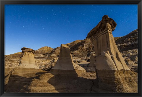 Framed Stars over the hoodoos in the Red Deer River valley, Alberta, Canada Print
