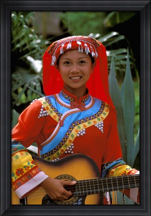 Framed Ethnic Dancer Playing Guitar, Kunming, Yunnan Province, China Print