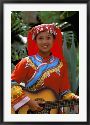 Framed Ethnic Dancer Playing Guitar, Kunming, Yunnan Province, China Print