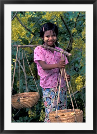 Framed Girl with Painted Face Carrying Basket on Shoulder Pole, Myanmar Print