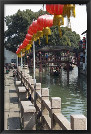 Framed Boat in canal with old wooden bridge, Zhujiajiao, Shanghai, China Print