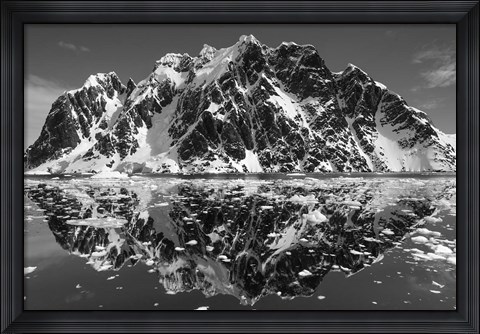 Framed Antarctica, Mountain peaks reflected in the Lemaire Channel. Print