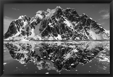 Framed Antarctica, Mountain peaks reflected in the Lemaire Channel. Print