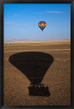 Framed Hot air balloon casting a shadow over Namib Desert, Sesriem, Namibia Print