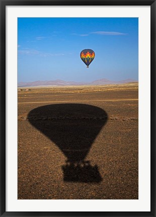 Framed Hot air balloon casting a shadow over Namib Desert, Sesriem, Namibia Print