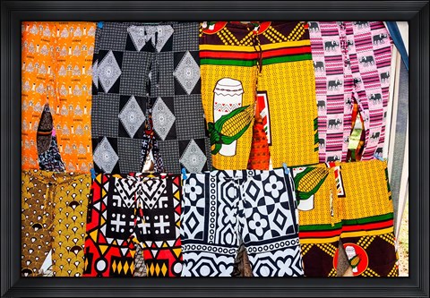 Framed Africa, Angola, Benguela. Bright colored pants for sale at local shop. Print