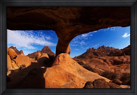 Framed Boy under natural rock arch at Spitzkoppe, Namibia Print