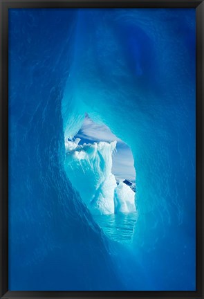 Framed Antarctica, Iceberg framed in arch of another in Wilhelmina Bay. Print