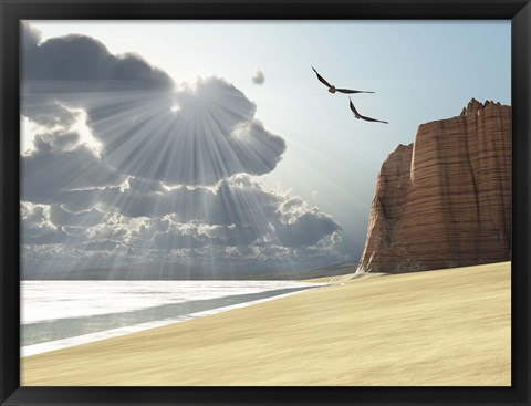 Framed Sunlight shines down on two birds flying near a cliff by the ocean Print