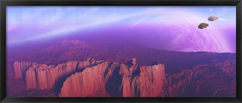 Framed Two spacecraft fly over a mountain range Print