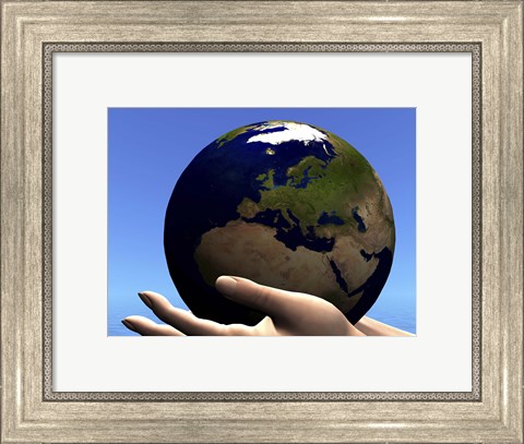 Framed planet Earth is held in caring human hands Print