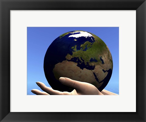 Framed planet Earth is held in caring human hands Print