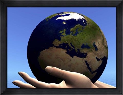 Framed planet Earth is held in caring human hands Print
