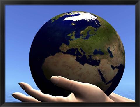 Framed planet Earth is held in caring human hands Print