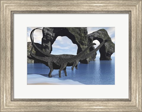 Framed Diplodocus dinosaurs wade through shallow waters of a beautiful seashore Print