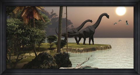Framed Two Brachiosaurus dinosaurs enjoy a beautiful sunset Print