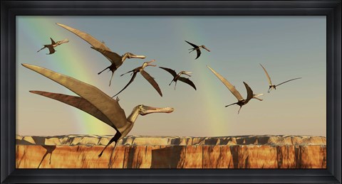 Framed flock of Pterodactyls fly out of a canyon Print