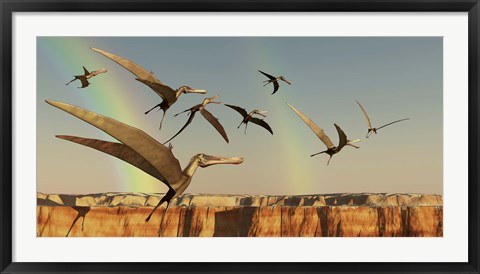 Framed flock of Pterodactyls fly out of a canyon Print