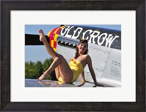 Framed Cute pin-up girl sitting on the wing of a P-51 Mustang Print