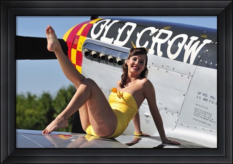 Framed Cute pin-up girl sitting on the wing of a P-51 Mustang Print