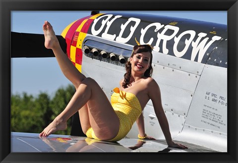 Framed Cute pin-up girl sitting on the wing of a P-51 Mustang Print