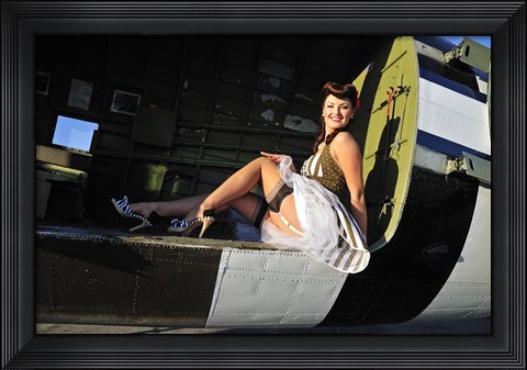 Framed Sexy 1940&#39;s style pin-up girl sitting inside of a C-47 Skytrain aircraft Print