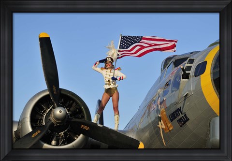 Framed 1940&#39;s style majorette pin-up girl on a B-17 bomber with an American flag Print