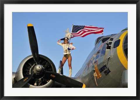 Framed 1940&#39;s style majorette pin-up girl on a B-17 bomber with an American flag Print