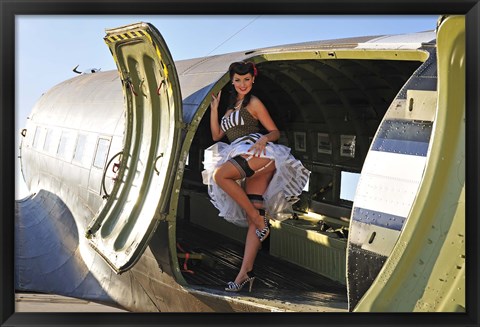 Framed Sexy 1940&#39;s style pin-up girl standing inside of a C-47 Skytrain aircraft Print
