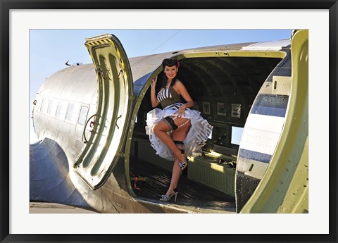 Framed Sexy 1940&#39;s style pin-up girl standing inside of a C-47 Skytrain aircraft Print